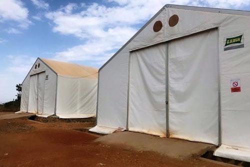 Food distribution tents at a Ugandan refugee settlement